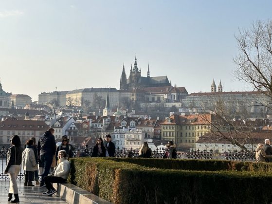 A view of the St. Vitus Cathedral and Prague Castle, the largest ancient castle complex in the world, from the historic Charles Bridge in downtown Prague.