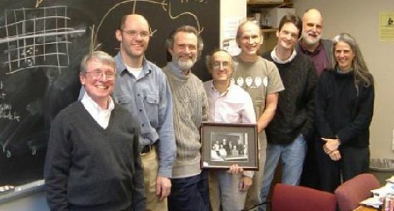The new BACH group in color, with Michael Cohen holding framed photo of the original BACH group (the picture on the left)