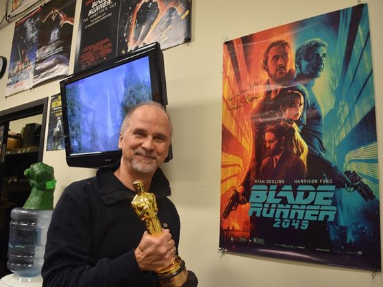 John Nelson poses with the poster for his 2018 Oscar Winner for Visual Effects, Blade Runner 2049.