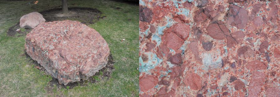 Side by side photographs; left, a brown and greenish boulder set in lawn, right, a close up showing brown and red stones embedded in a lighter brown matrix with greenish coper staining.