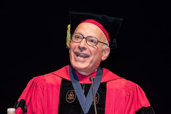 Image of Jim Adams at a previous Commencement