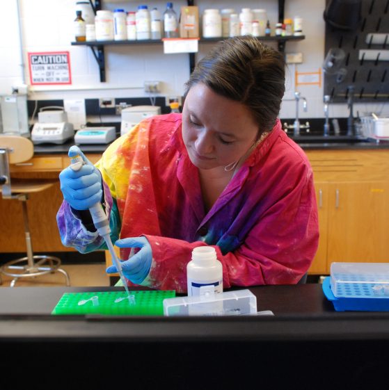 Natalie Greenhalgh works in the lab.