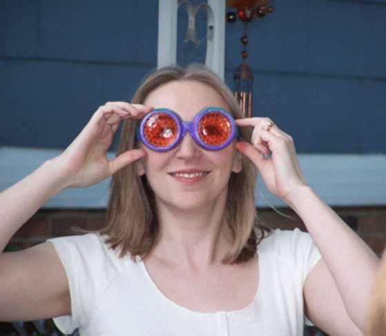 Patricia Wittkopp wearing fly vision goggles. 