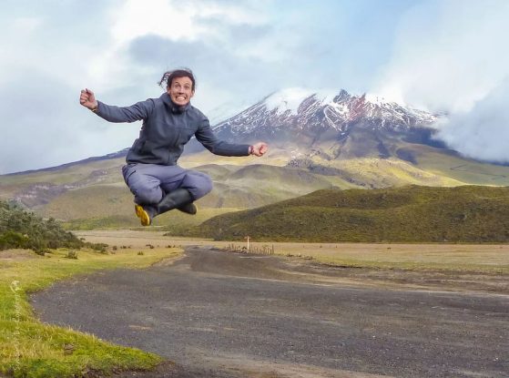 Simon Uribe-Convers is jumping for joy about these awards. Image taken in front of Cotopaxi, Ecuador.