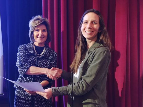 Giorgia Auteri receives the Midwest Bat Working Group’s Best Student Oral Presentation award from Colleen Callahan, director of the Illinois Department of Natural Resources, in Chicago, Ill.