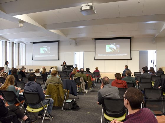 The 2019 Early Career Scientists Symposium was held in the Biological Sciences Building for the first time. View from the back of the room with speaker in the front and many people in the audience.