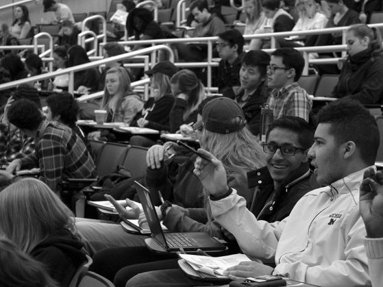 Students sitting in an auditorium in one of Meghan Duffy's introductory biology classes, black and white.