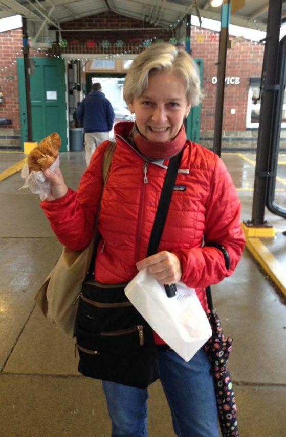 Priscilla Tucker at the Ann Arbor Farmer’s Market admiring a croissant. (She is an avid baker!) 