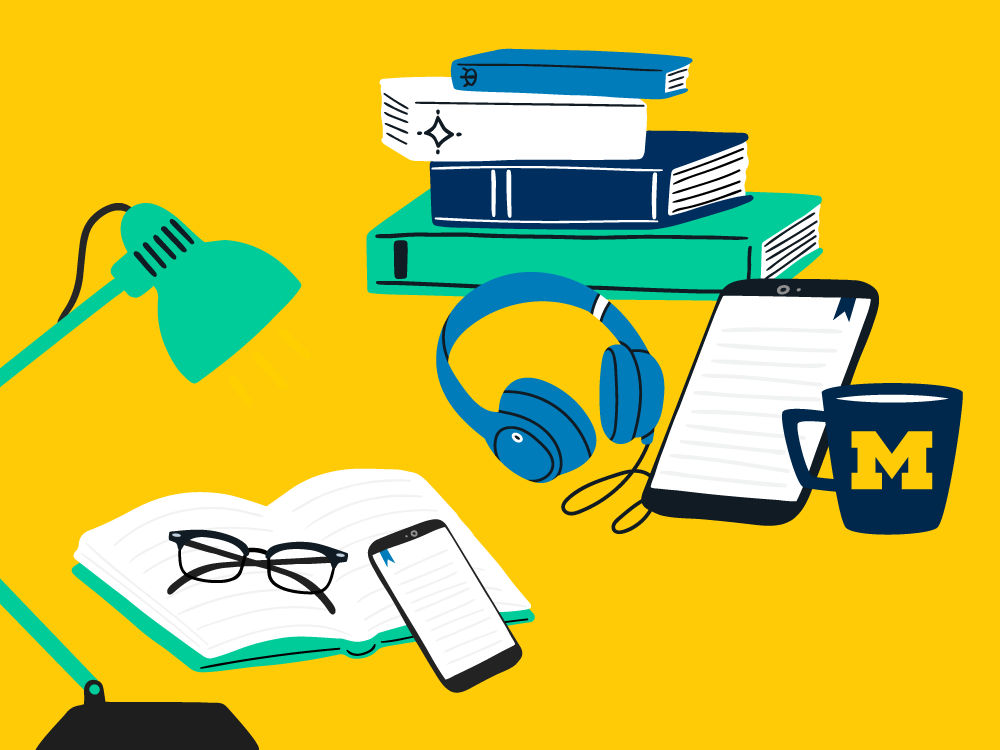 Yellow background featuring a green desk lamp, four stacked books, a pair of glasses on a book with cellphone, blue headphones, an iPad and blue U-M coffee mug.
