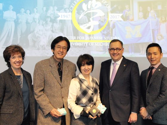 From left to right: Gail Flynn, Masao Oka, Mayumi Oka, and Andrew Martin stand onstage for a photograph