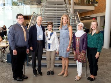 Fred and July Wilpon pose with LSA Dean Anne Curzan and U-M students Alaa Shanin, Sarah Meer, and Jared Gonder, a Kessler Scholar.
