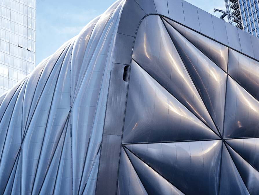 The outer shell of the Shed, in New York’s Hudson Yards neighborhood, weighs eight million pounds and moves on six-foot-tall bogie wheels, expanding or contracting based on the needs of the art space. LSA alumnus Justin Wong began working at the Shed the year before it opened, when it was “just a skeleton with no escalator.”