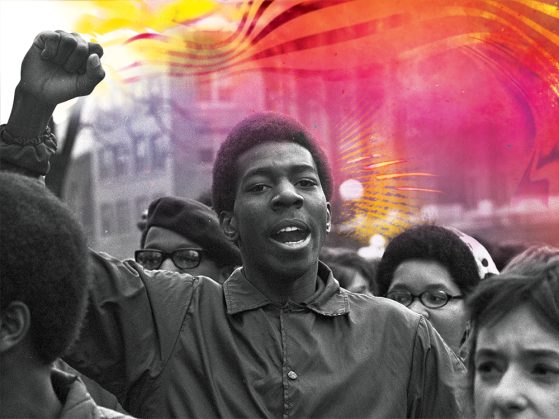 Black and white photo of male student in the middle of a crowd of protesters mid-chant, holding his fist in the air. An illustration of red, pink, yellow and orange colors swirl to his right. 