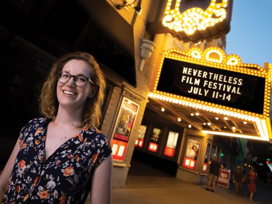 Photograph of alumna Meredith Finch outside of the Michigan Theater