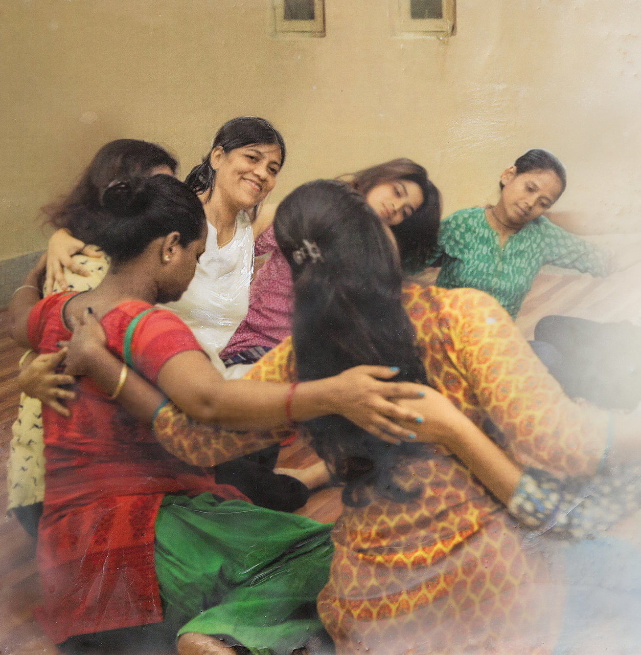 Sohini Chakraborty helping a group of survivors using dance/movement therapy.