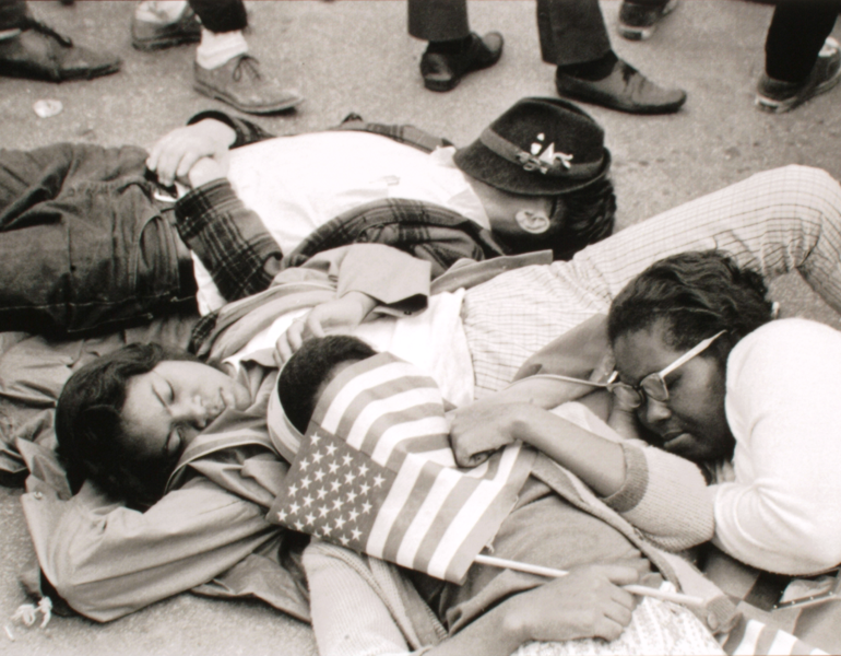 Edward (Robbie) Roberson’s documentary photograph “Tired Marchers Sleep on the Streets—‘We were tired, we were tired.’, Selma, Alabama”