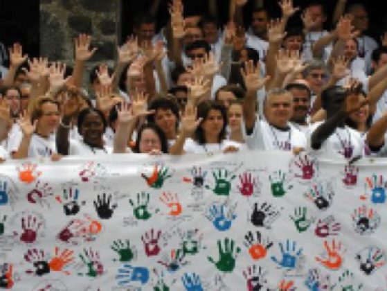 Amnesty International - raising hands in solidarity 