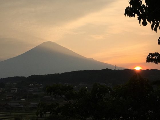 Sunrise behind Mount Fuji