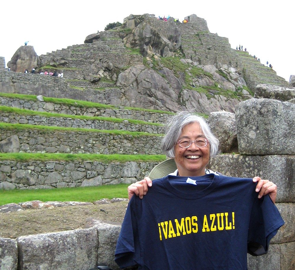 Beatrice Teodoro Oshika poses at Machu Picchu with Vamos Azul! t-shirt