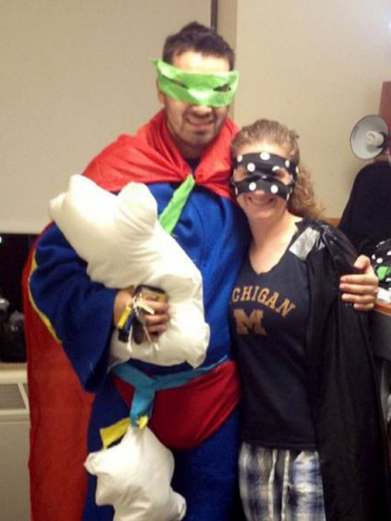 LHSP alumni Stevon Rendon and Amanda Wenger dressed up as pajama superheros with masks on
