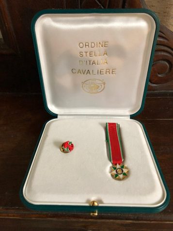 Picture shows the medal of "Cavaliere dell'Ordine della Stella d'Italia" (Knight of the Order of the Star of Italy).
