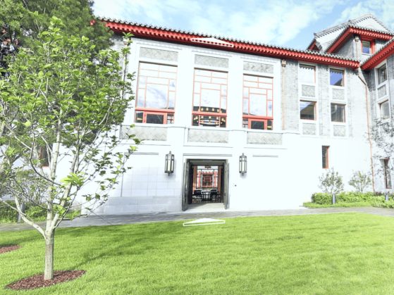 Schwarzman scholars main campus shows a white three-story building with red accents