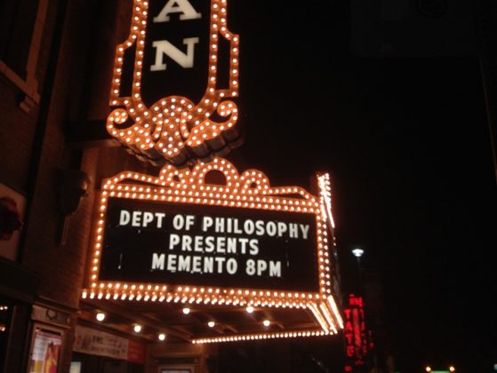 Michigan Theater sign that reads "Dept of Philosophy Presents Memento 8pm"