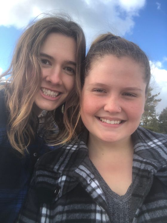 Closeup/selfie of two students smiling