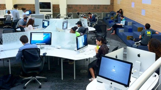 Broad view of students using a University computer lab