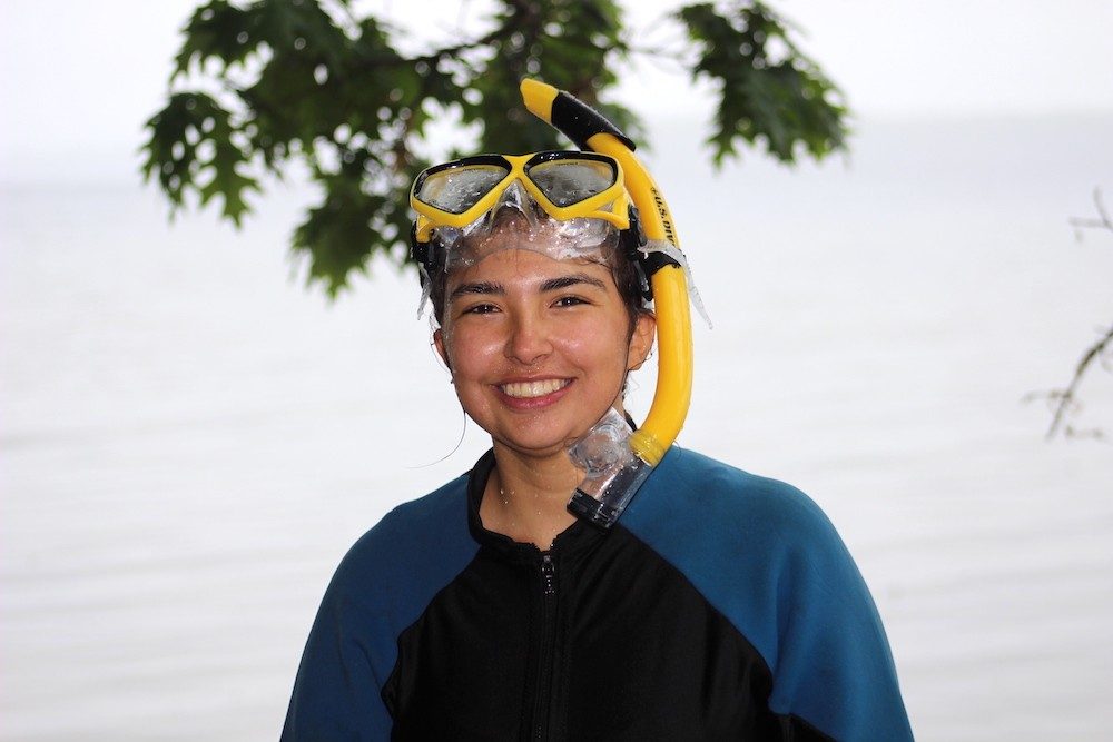 Portrait photo of Emma Thomson wearing snorkeling gear