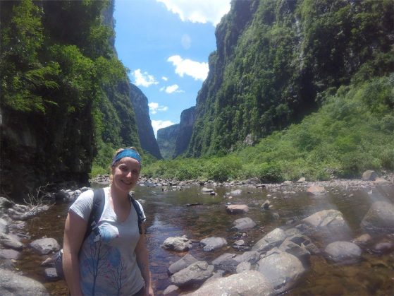Andréa Thomaz hiking a trail in southern Brazil.